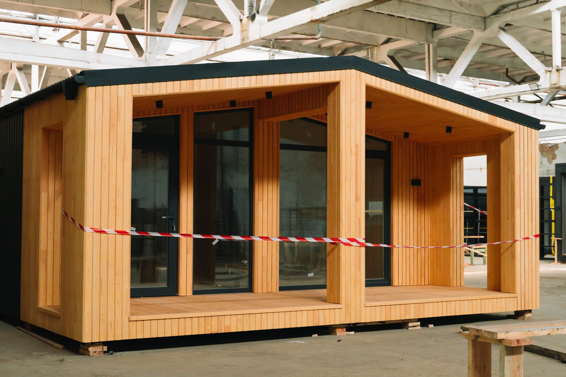 Exhibition of new and modern prefabricated modular house from composite wood panels. Energy efficient panel assembling